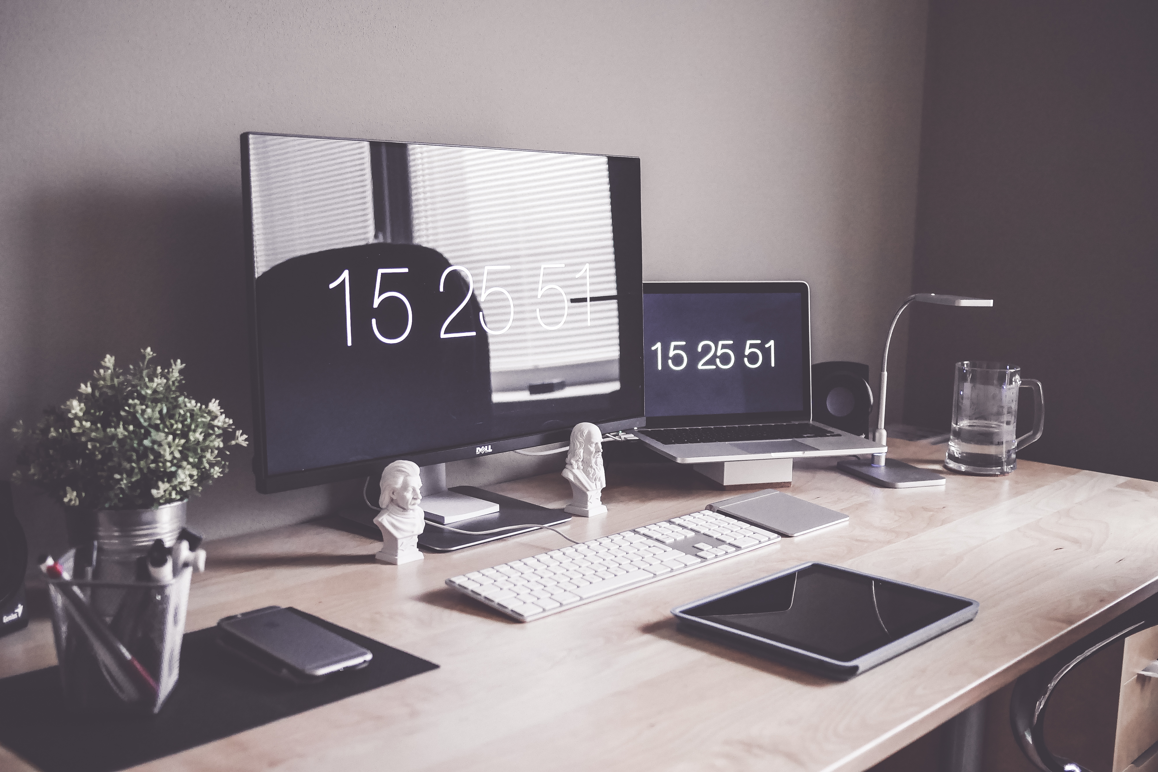 small business organised- Organised work space with a desktop a laptop and ipad