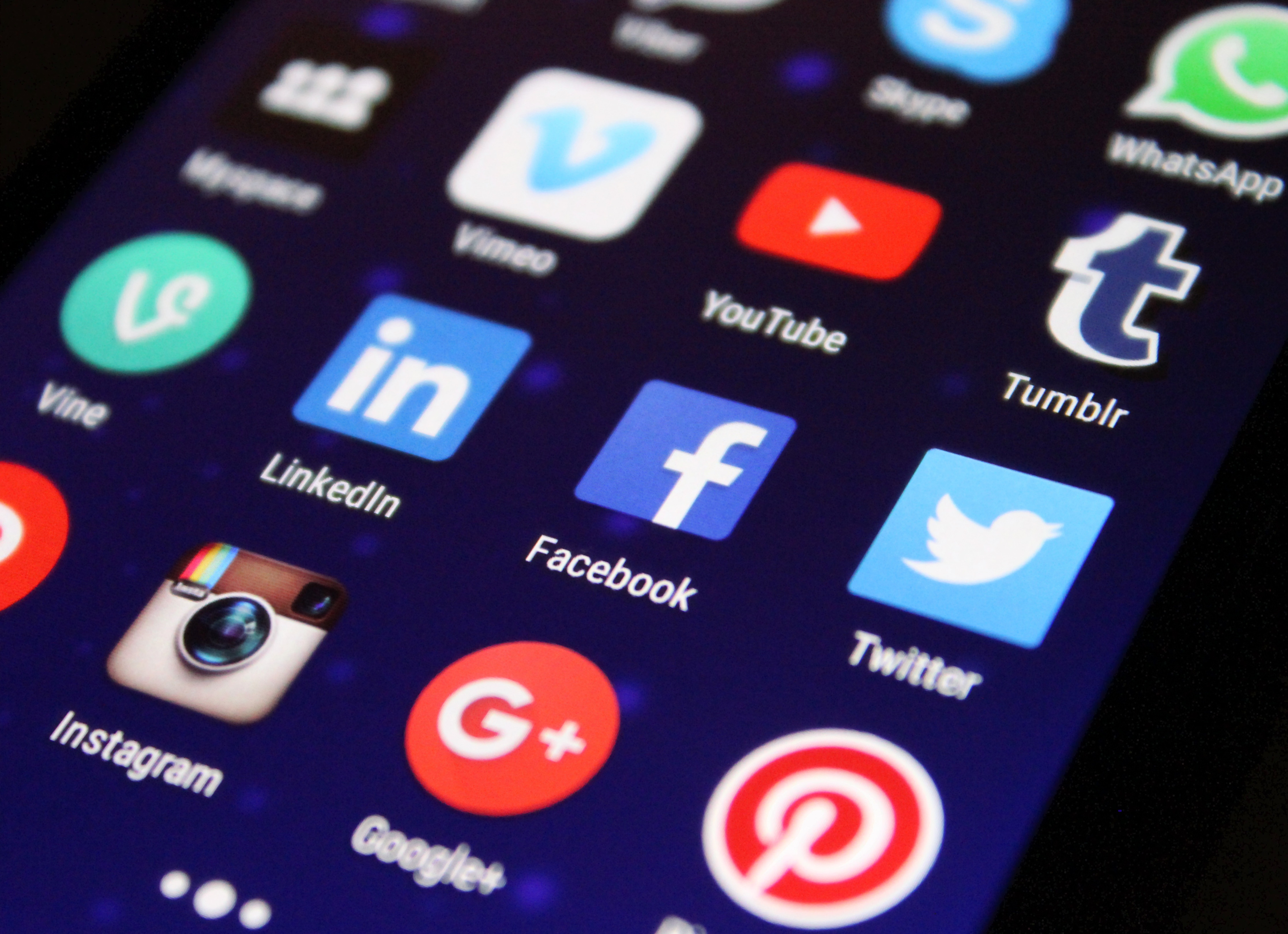 social media for your small business - Social media apps displayed on a smartphone homepage