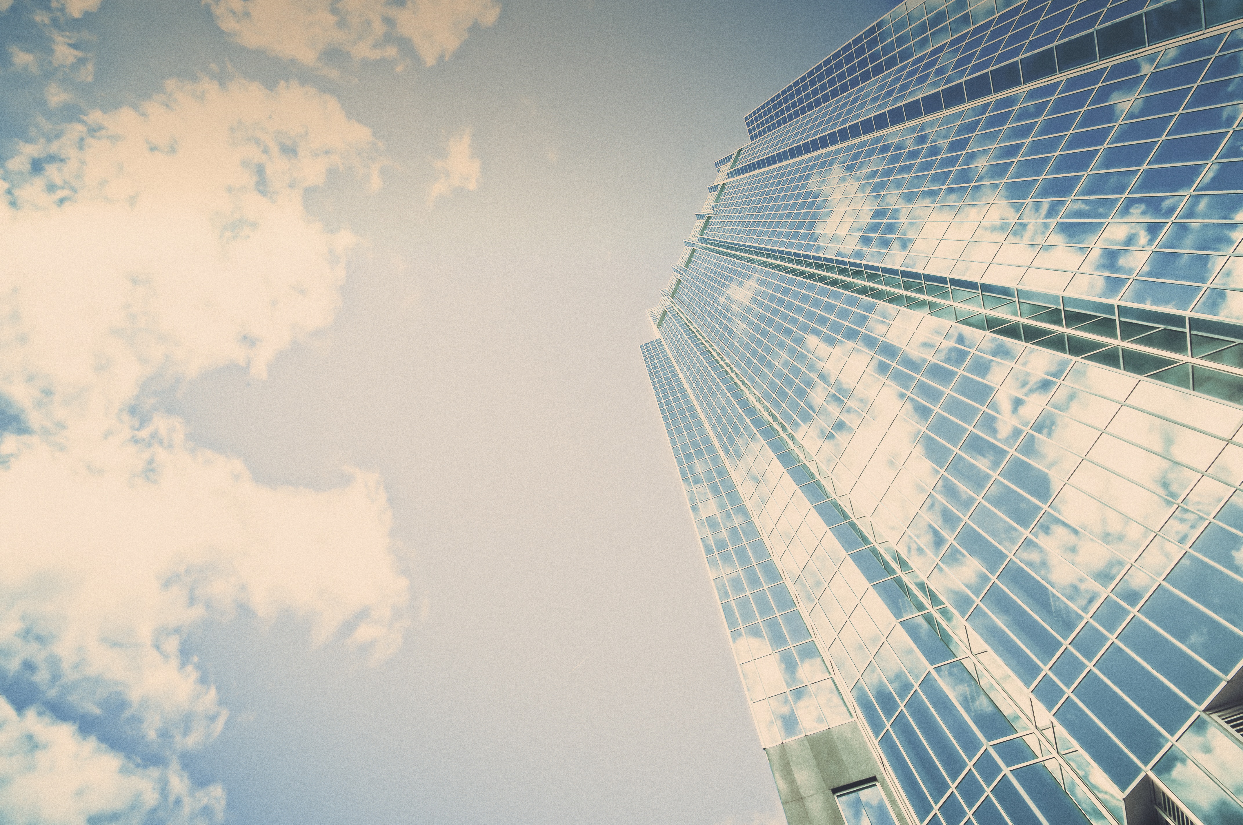 Grow a business - tall building skyscraper against a blue sky