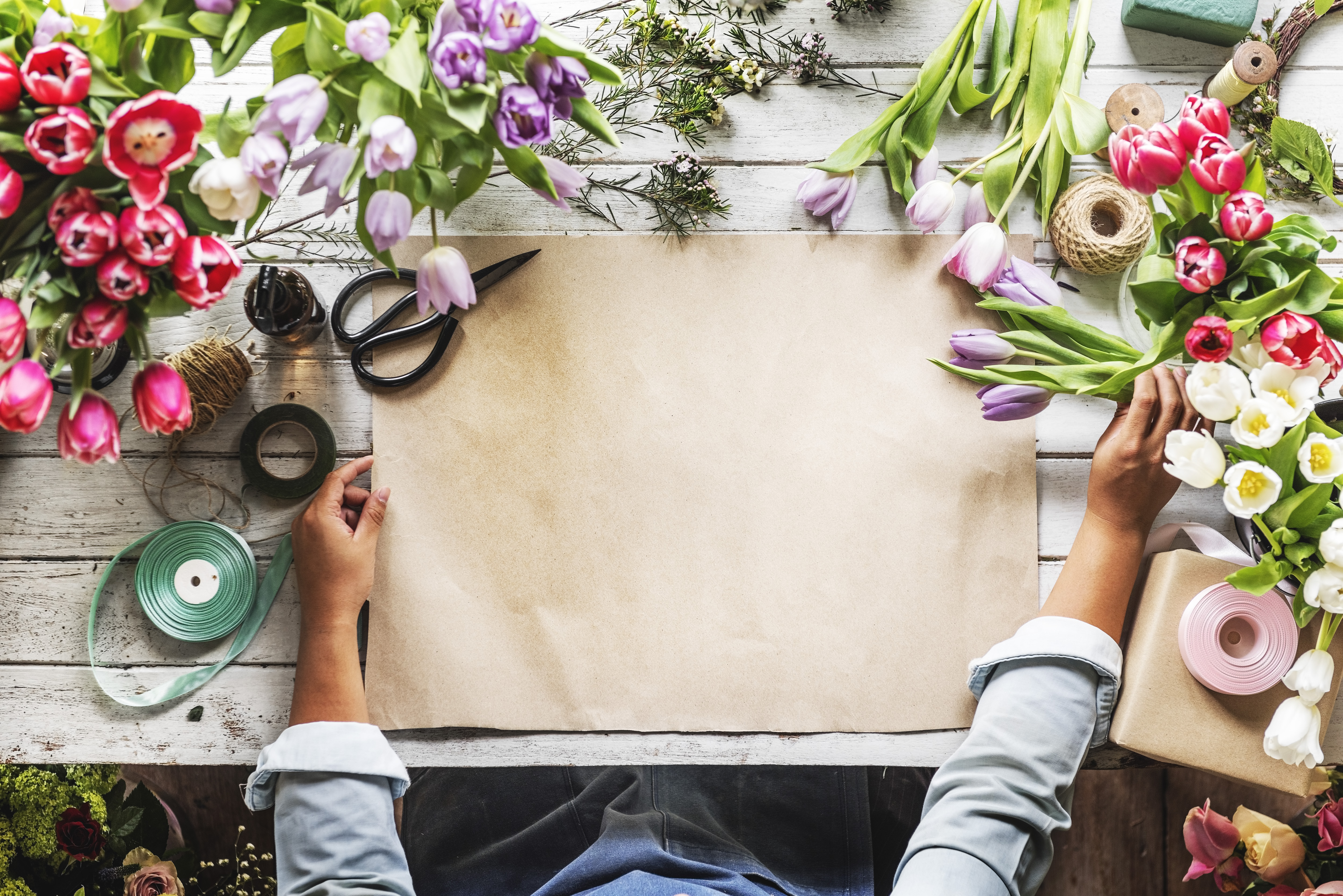 Florist business -Florist Showing Empty Design Space Paper on Wooden Table with Fresh Flowers Decorate